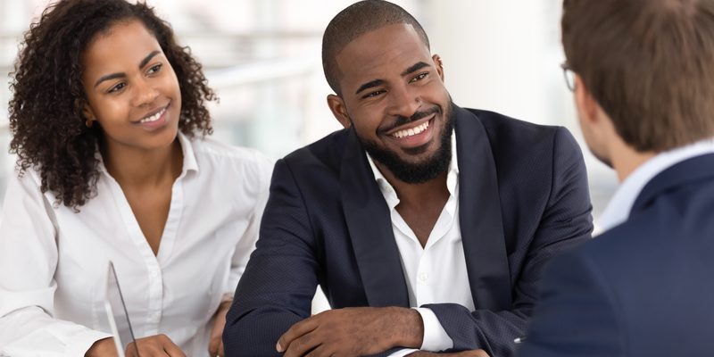 african american couple happy consultation