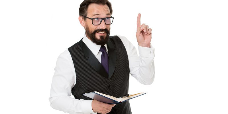 Man formal clothes hold notepad white explain business topic. Business school concept. Expert eyeglasses smart teacher. Business academy lecturer. Speaker business conference isolated white