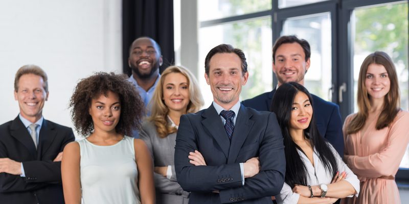 Boss And Business People Group With Mature Leader On Foreground In Office, Leadership Concept, Successful Mix Race Team Of Businesspeople Wearing Suits, Professional Staff